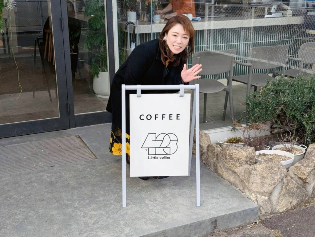 看板と写真を撮る